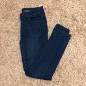 gently worn dark washed denim jeans